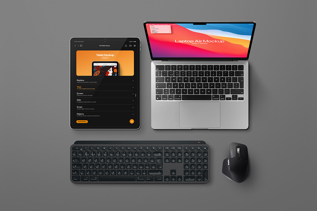 A flat-lay arrangement showing a MacBook Air, an iPad Pro, a keyboard, and a mouse on a grey background.