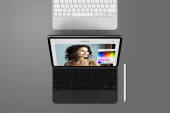 Free iPad Pro mockup with two tablets, keyboard, and Apple Pencil, isolated PSD file with editable Smart Objects and separate shadows for app, UI, and branding previews.