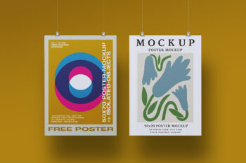 Free poster mockup with two 50 × 70 cm posters side by side, isolated PSD with editable Smart Objects and independent shadows for branding and print design.
