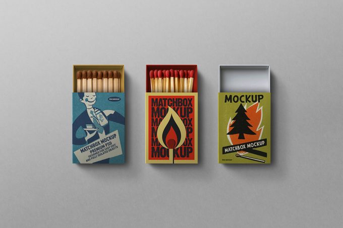 Matchbox mockup flat-lay with three boxes featuring different vintage designs, editable Smart Objects for packaging, branding and product design.