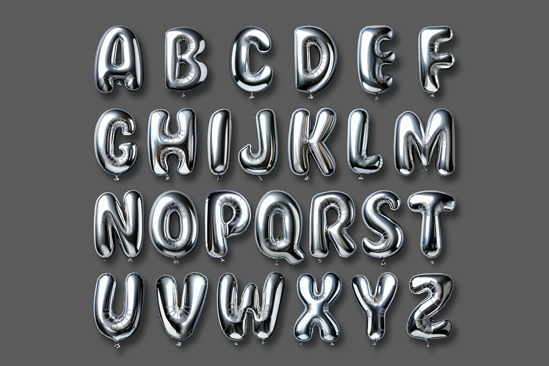 Balloon letters PSD featuring full metallic foil alphabet A to Z in silver tone arranged in rows on gray background with realistic reflections for celebration graphics and print design.