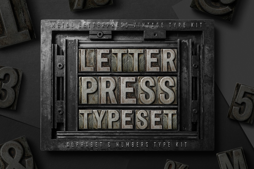 Metal letterpress alphabet arranged inside printing chase frame for typography and vintage print presentation.