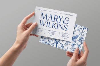 Wedding invitation mockup with floral card and hand holding composition for wedding stationery branding and invitation previews.