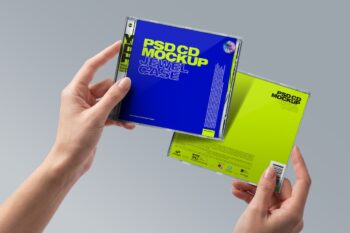 CD jewel case mockup with two hands holding a blue front cover and green back cover on a gray background