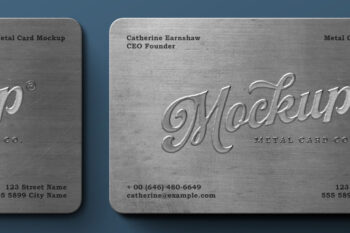 Free metal business card mockup close-up of two brushed steel cards showing embossed logo and text detail