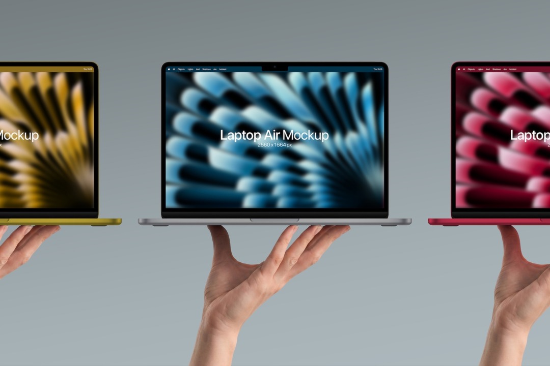 MacBook Air mockup in hand showing three laptops in yellow, silver and red resting on open palms.