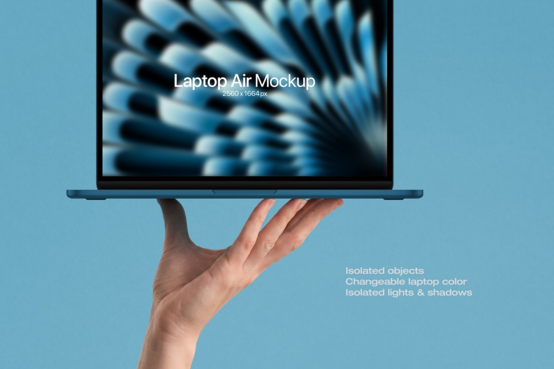 MacBook Air mockup in hand with a blue laptop balanced on one open palm against a blue background.