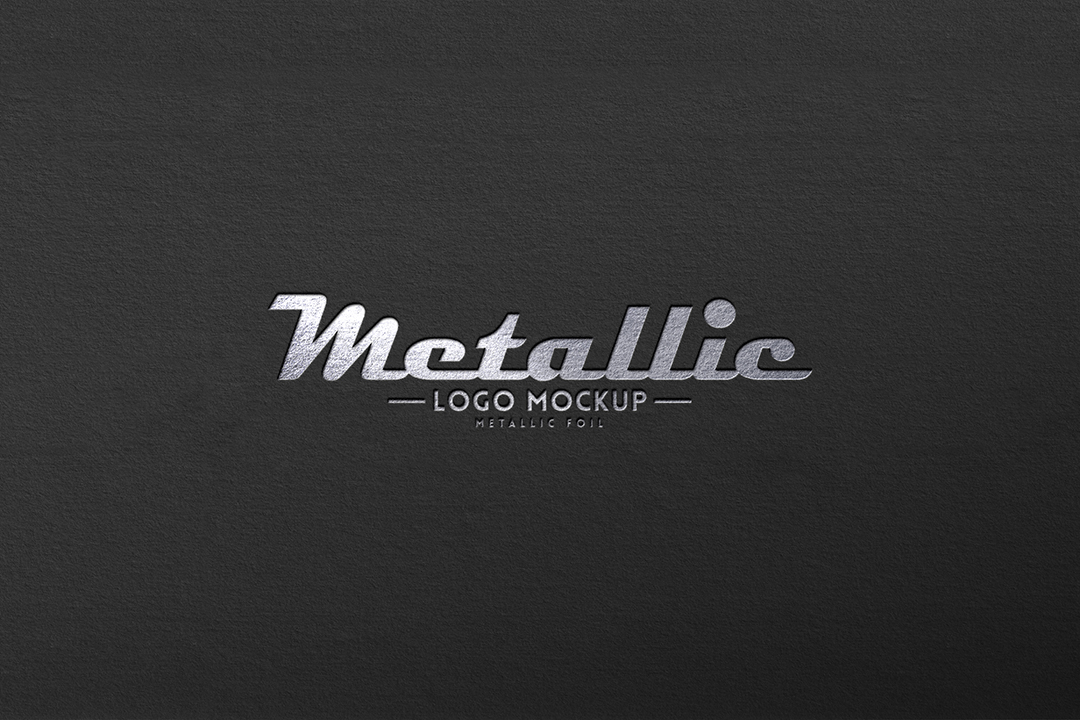 Metallic foil logo mockup with a silver script wordmark stamped on dark grey textured paper