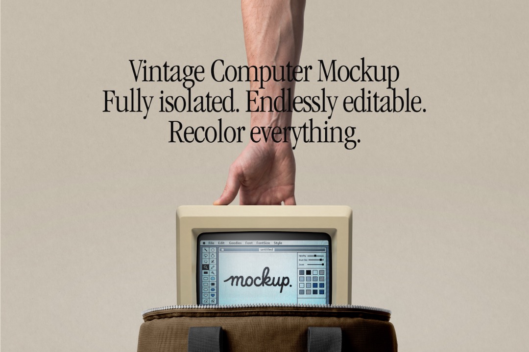 Retro computer mockup in hand showing a beige vintage desktop lifted from an olive canvas carry bag
