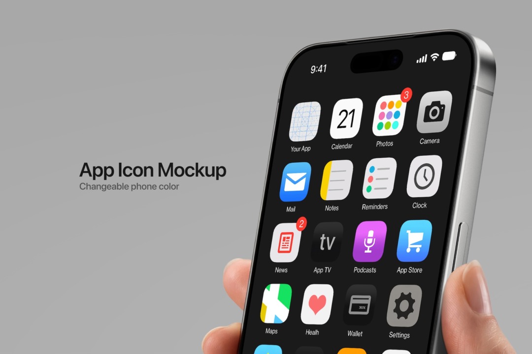 App icon mockup in hand, phone home screen filled with app icons and labels, held at an angle.