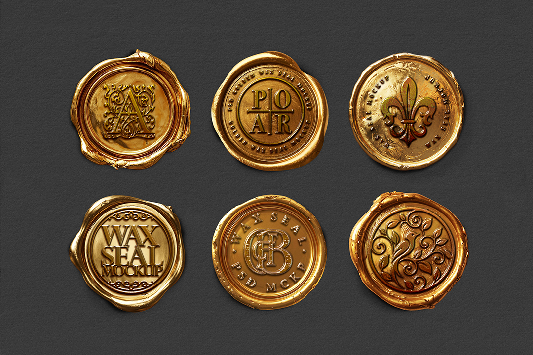Metallic gold wax seal mockup set of six embossed stamps arranged in a grid on dark gray paper