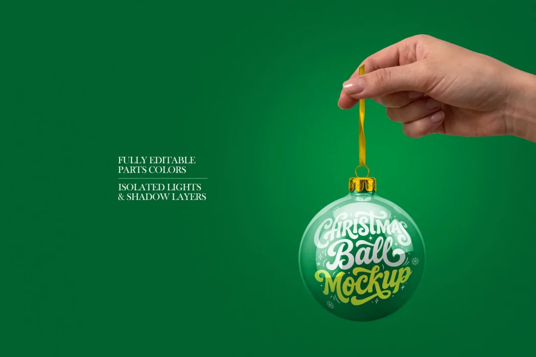 Christmas ball mockup in hand on green background, green bauble with gold cap dangling from a gold ribbon